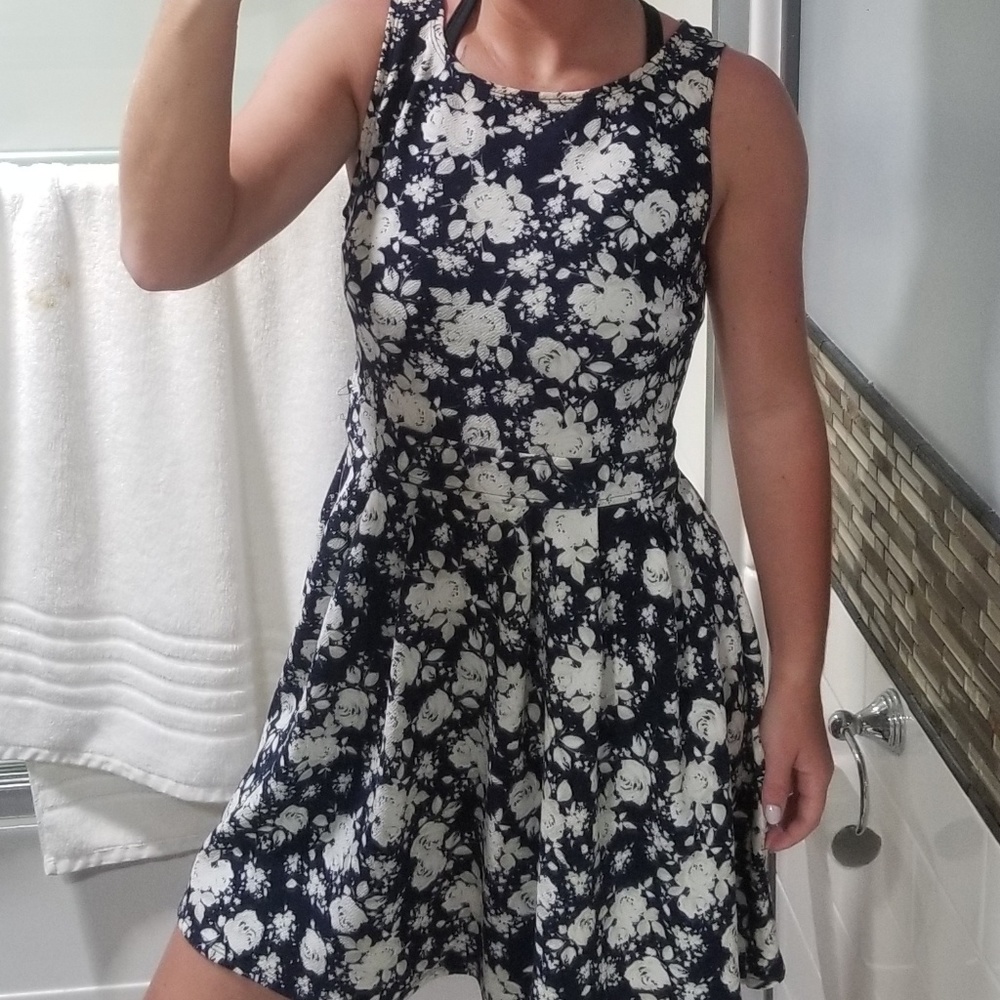 Floral short sleeve skater dress with back cutouts